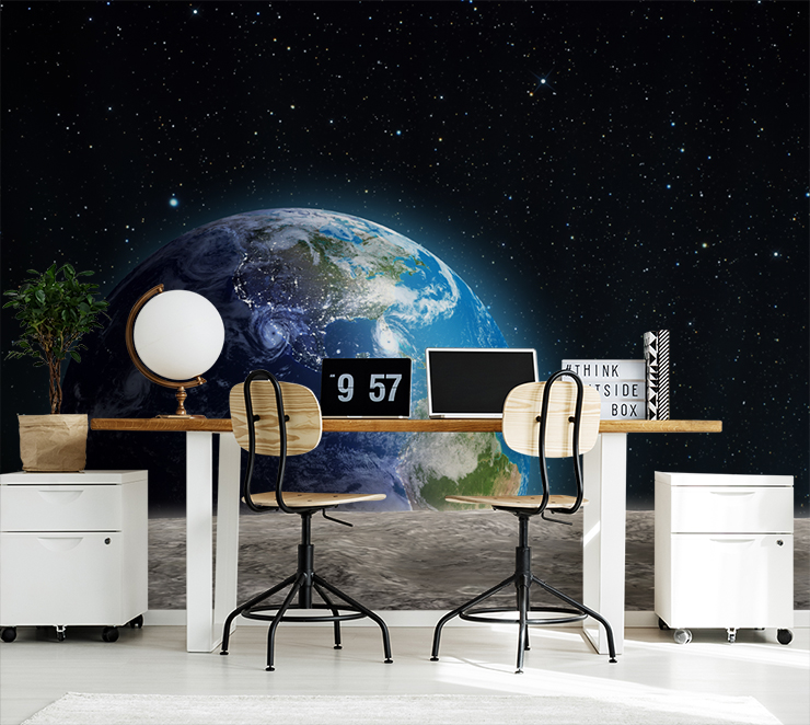view of the earth from the moon wallpaper in trendy office with two desk chairs