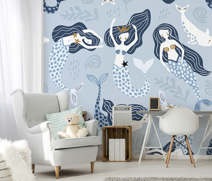 blue and white mermaid and dolphin wallpaper in cosy childs bedroom