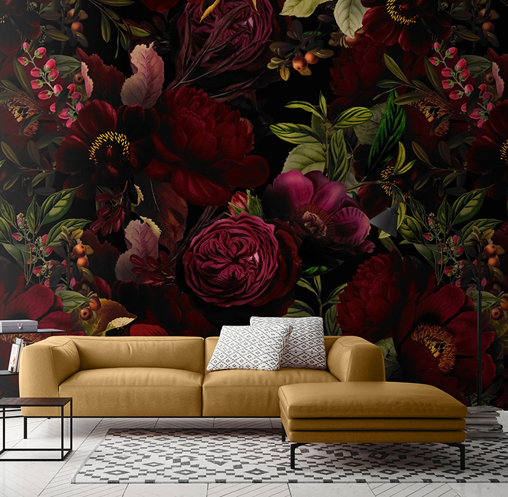 maroon coloured dark flowers in living room with mustard-yellow sofa