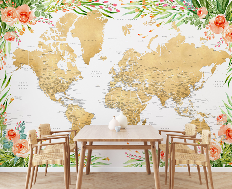 golden coloured map with leafy green and pink painted floral boarder