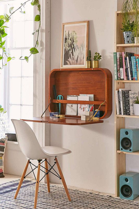 retro lounge with wooden pull out desk with white and wood chair