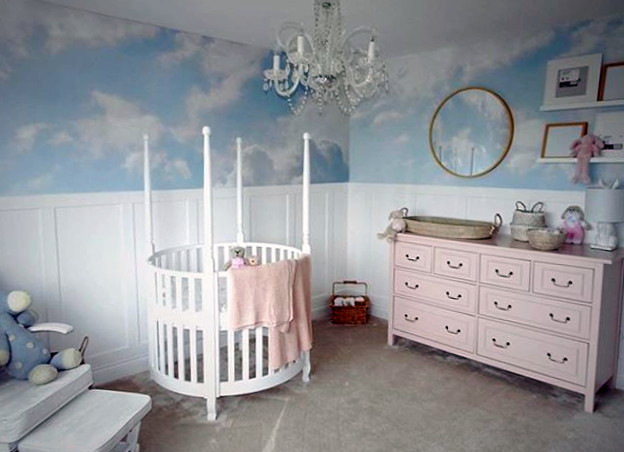 blue and white clouded sky wallpaper in pink and white nursery