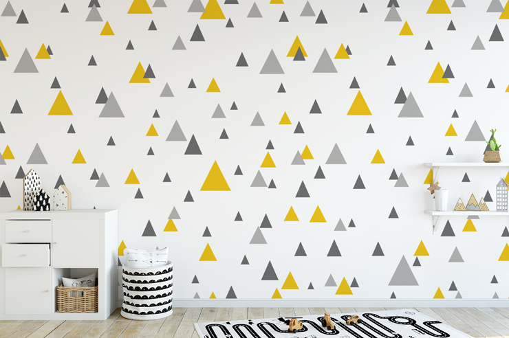 grey and yellow triangles wallpaper in cute nursery