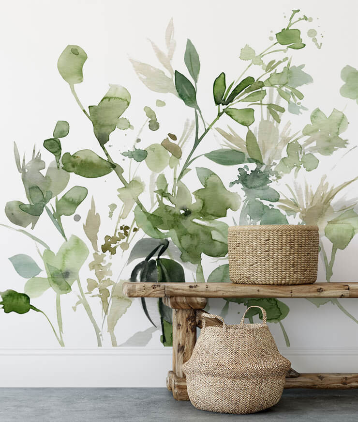 green watercolor of plant wall mural in room with wicker baskets