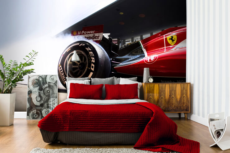 red ferrari car in motion with close up of wheel wallpaper in bedroom with red bed