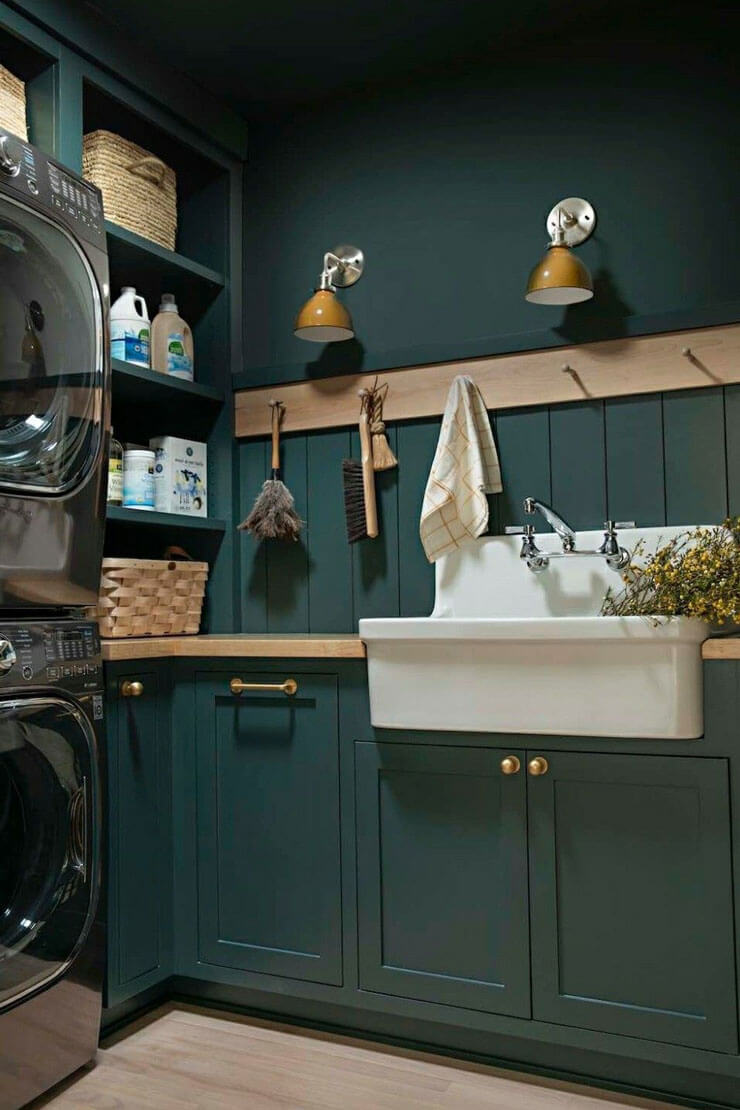 dark green cabinets in laundry room 