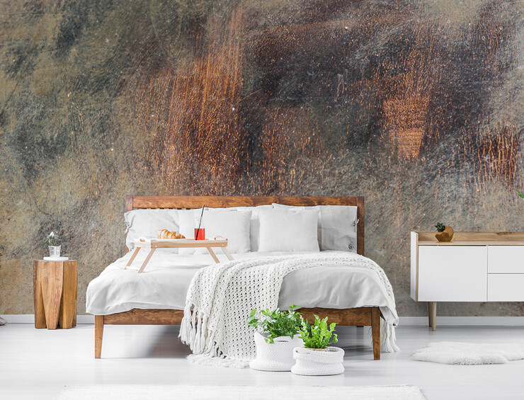 rusty orange and grey rust wallpaper in bedroom with wooden bed
