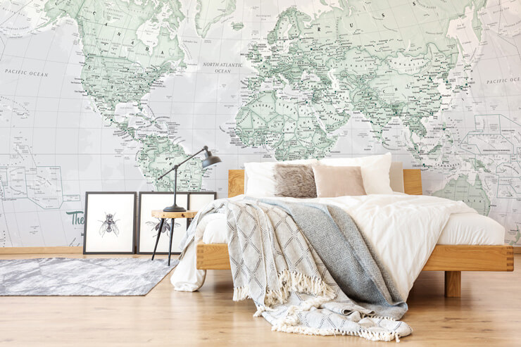 pale green world map wallpaper in white minimalist bedroom