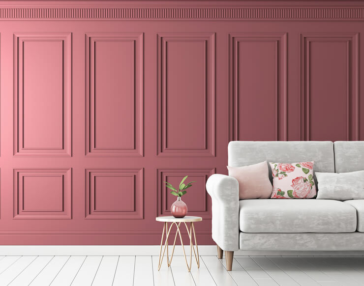 3d effect pink wood panel wallpaper in living room with pastel grey sofa and floral cushion