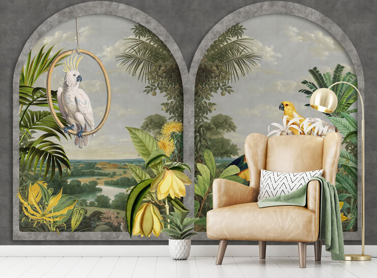 illustrated window with tropical birds in tones of yellow, grey and green in room with light tan leather chair