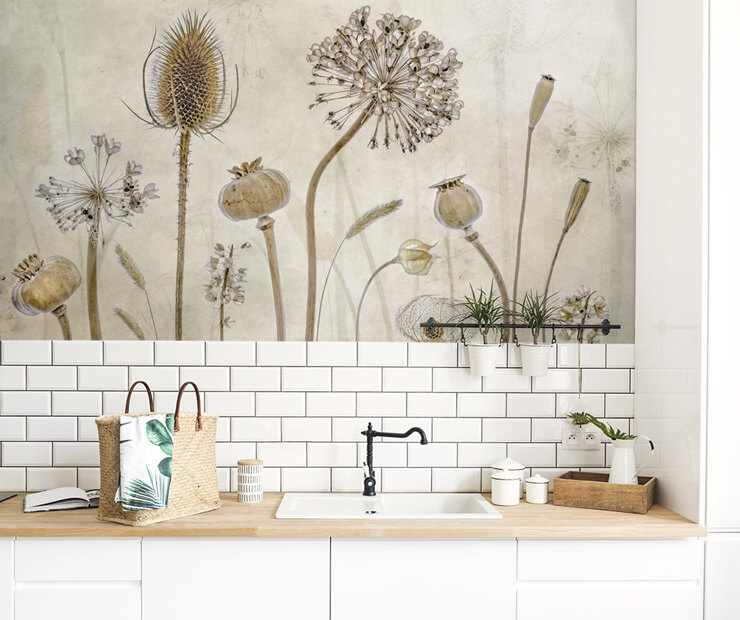 dried flowers photograph wallpaper above white tile splash back in trendy kitchen