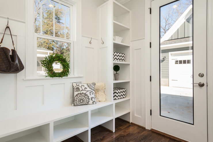 mudroom ideas for a white mudroom with black and white accessories
