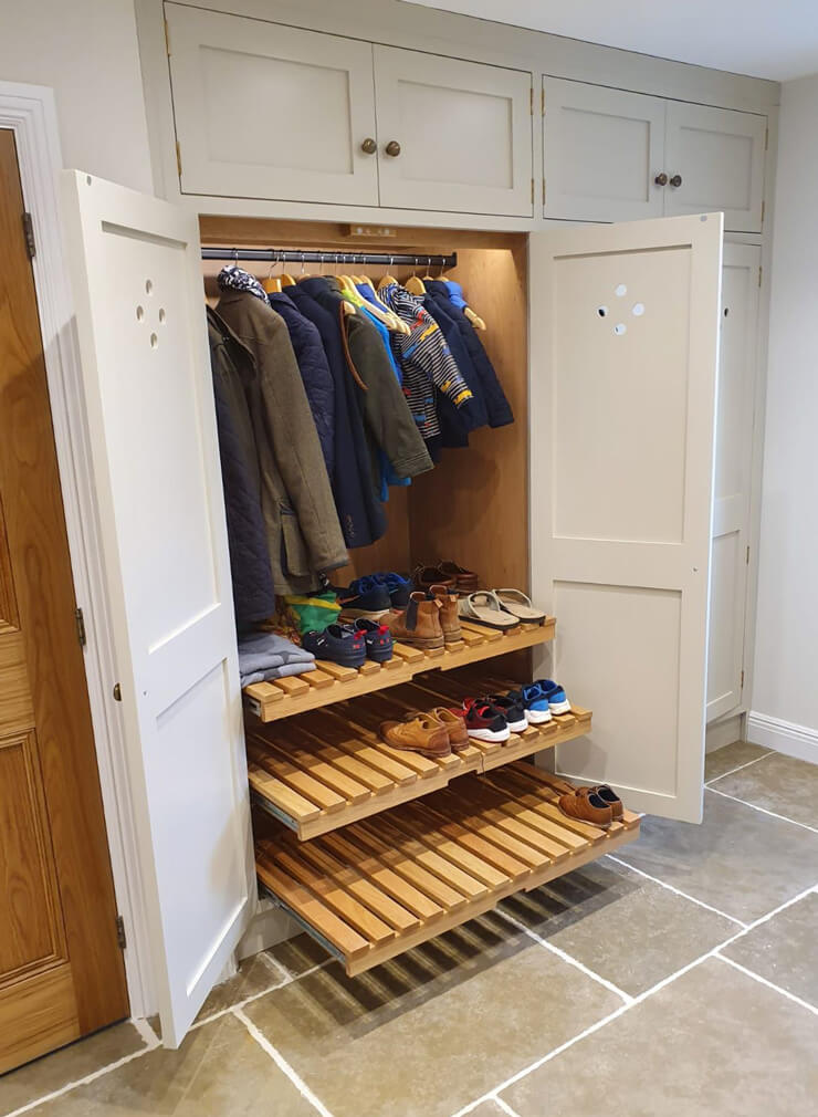 white and wood shoe sliding storage