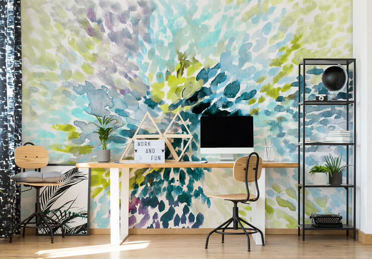 purple, teal and green explosion painting on white background in simple home office