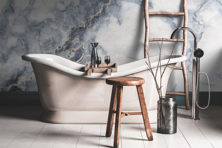 blue and white marble wallpaper in boho bathroom