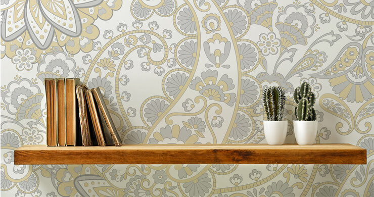 light grey and yellow retro wallpaper shelves with wooden shelf in front of it