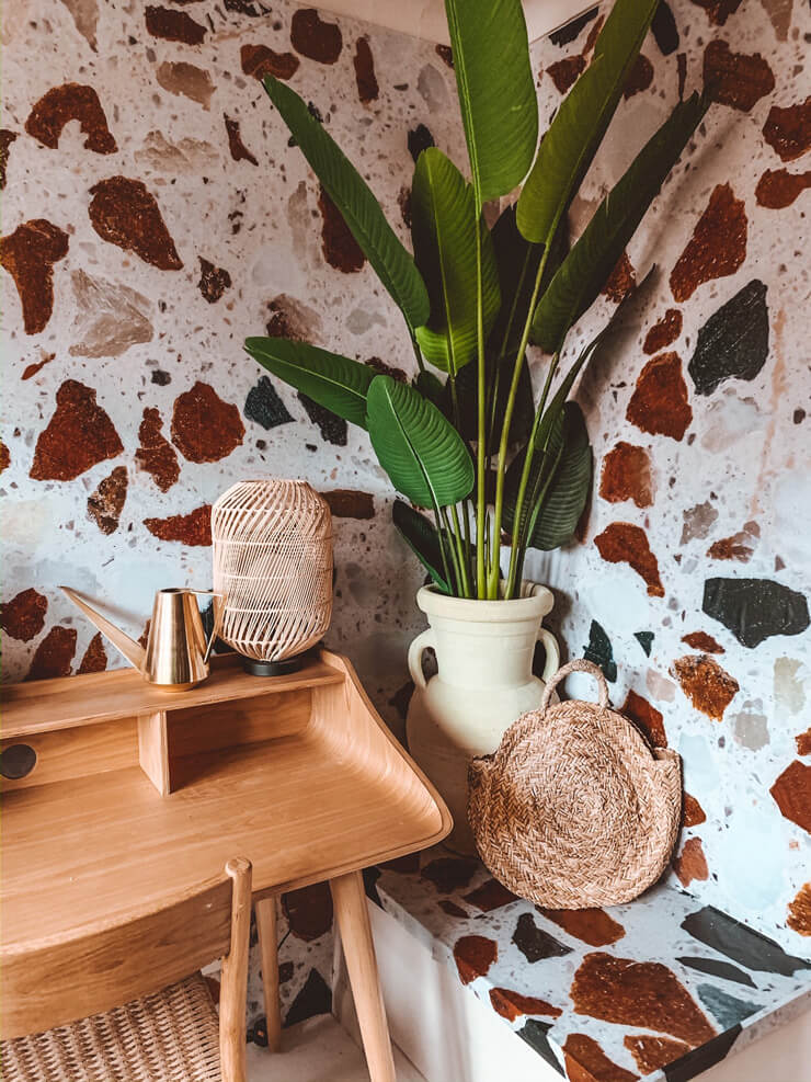 brown, white and black terrazzo wallpaper in boho home office