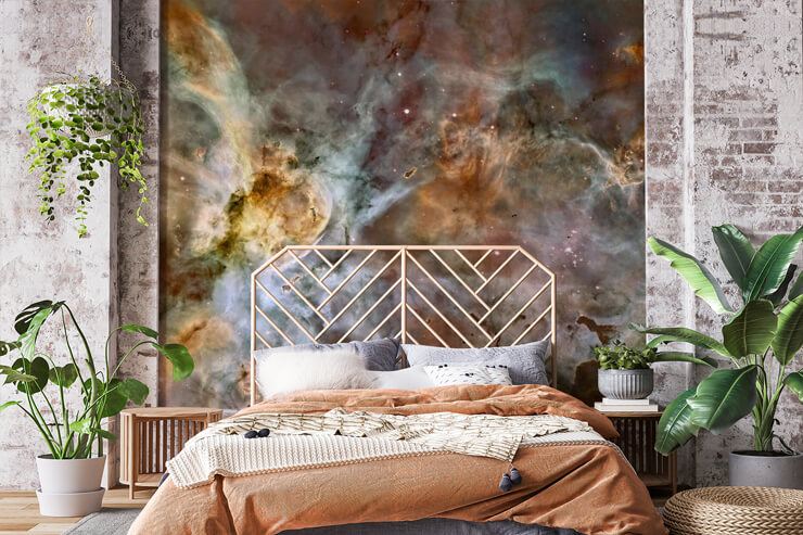 bronze and silver toned nebula wallpaper in boho bedroom