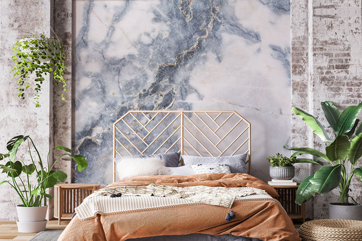 blue and white natural marble in orange and white boho room full of plants