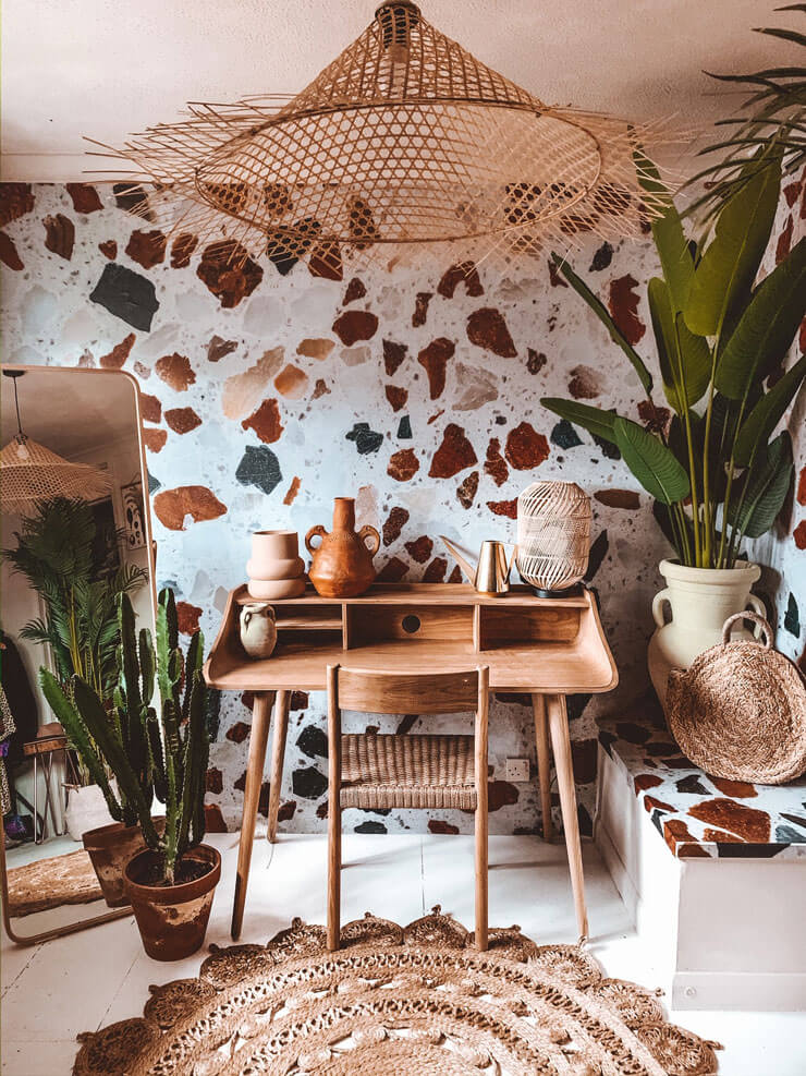 off white, brown and black terrazzo mural in boho style office