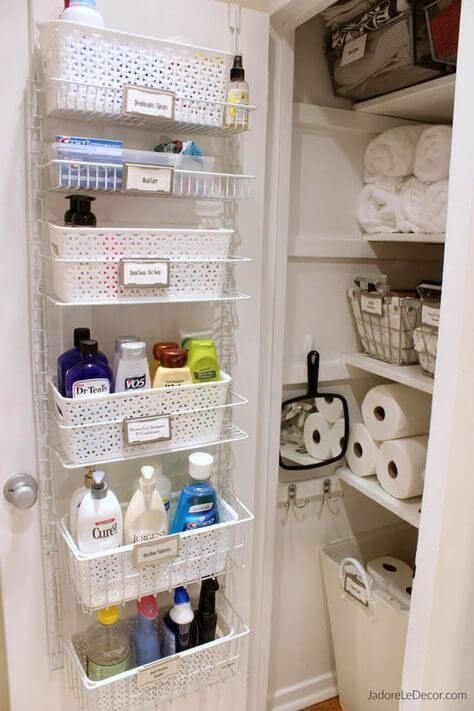 bathroom cupboard with boxes to store items
