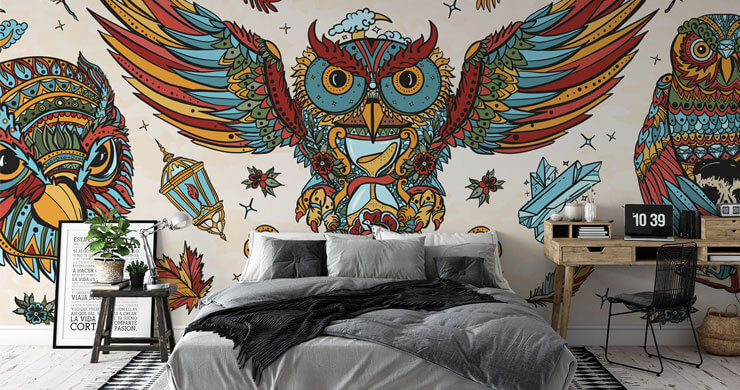 red, orange and blue owls wallpaper in dark bedroom