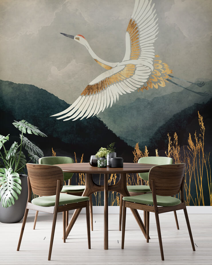 blue and gold bird wallpaper in sage green dining room