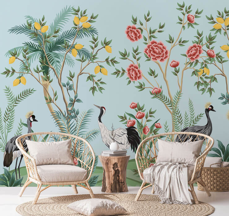 Duck egg blue wallpaper with birds and flowers with natural wicker décor