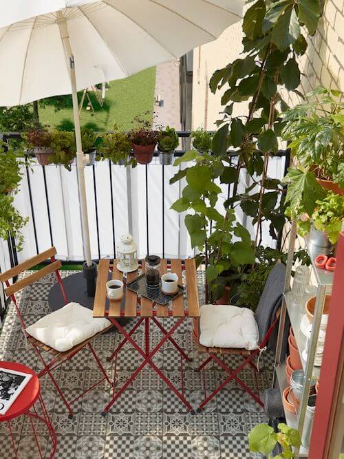 outdoor office with red dining set and seat cushions