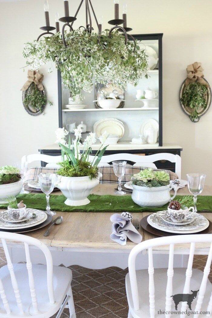 leaf decorated chandelier in dining room