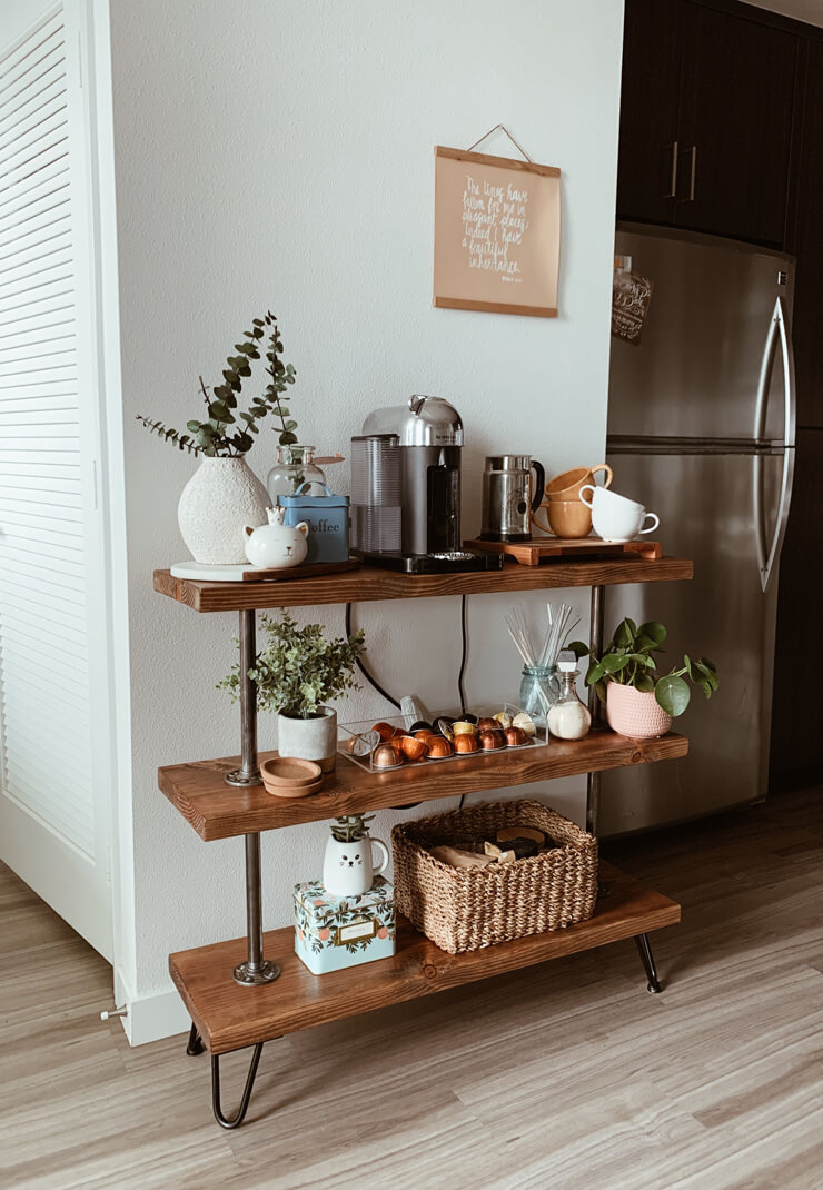 natural wooden shelves with mugs and coffee machine