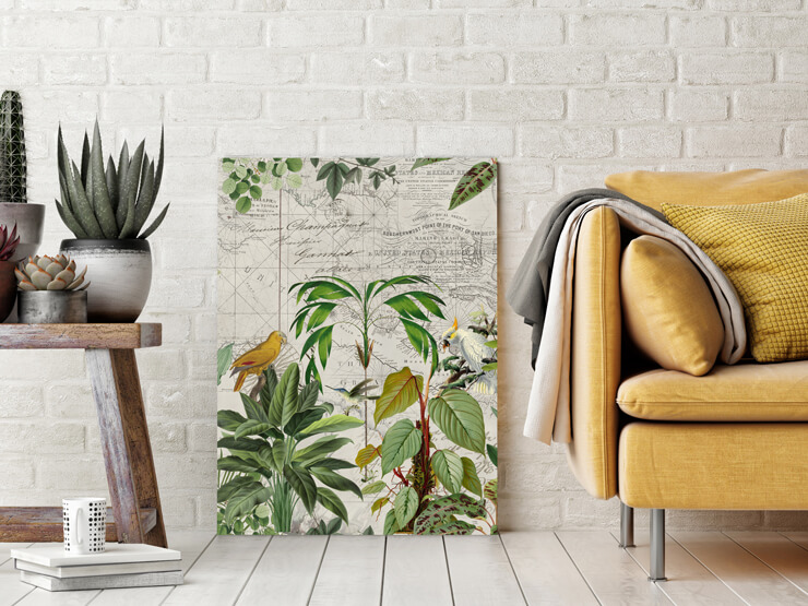 tropical jungle and bird botanical prints in trendy lounge