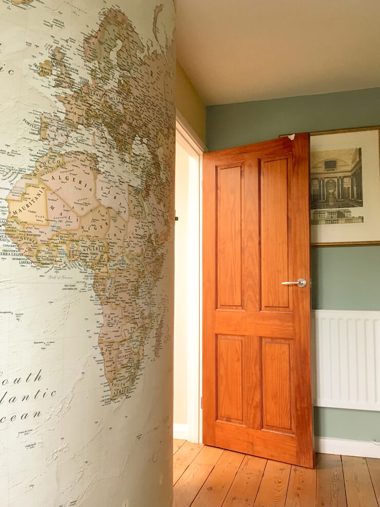 natural coloured map wallpaper on rounded wall