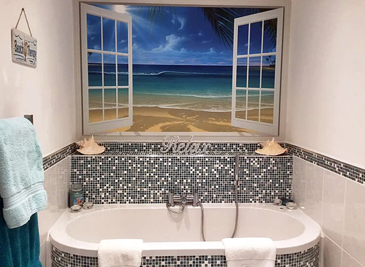 beach window in beautiful bathroom above bath