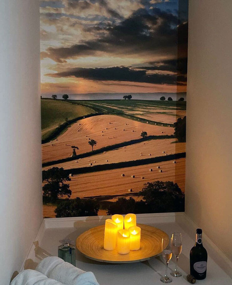 countryside wallpaper in bathroom spa