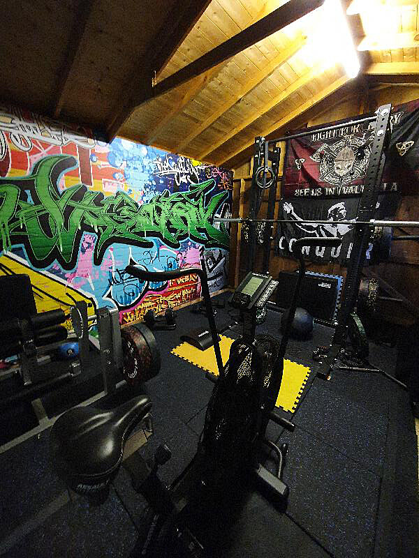 Funky and colourful graffiti style home gym ideas