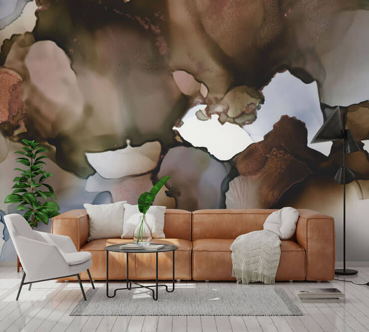 brown and white watercolor wallpaper in lounge with tan sofa