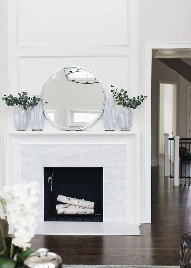 white, minimalist mantelpiece decor