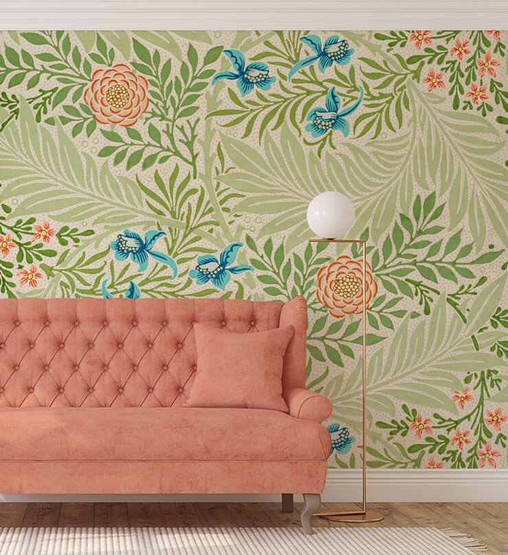 green and pink floral wallpaper with vintage coral sofa