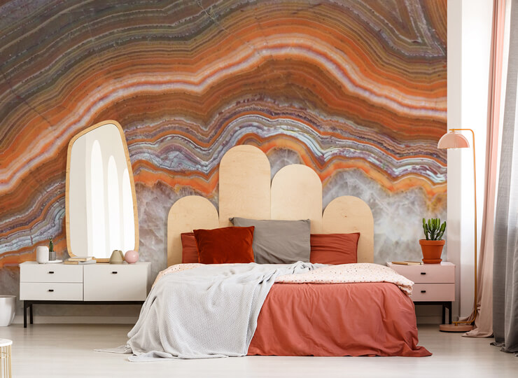 orange and off white marble wallpaper in an burnt-orange bedroom