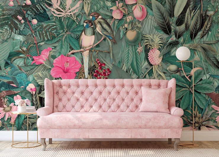 green and pink tropical wallpaper with pink couch in living room