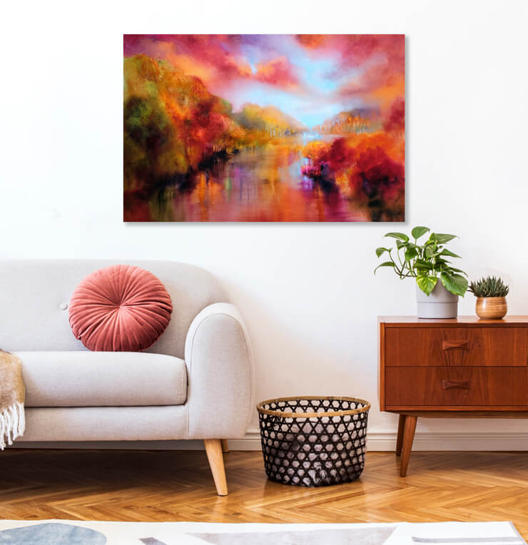 red and orange landscape wall art in cosy living room