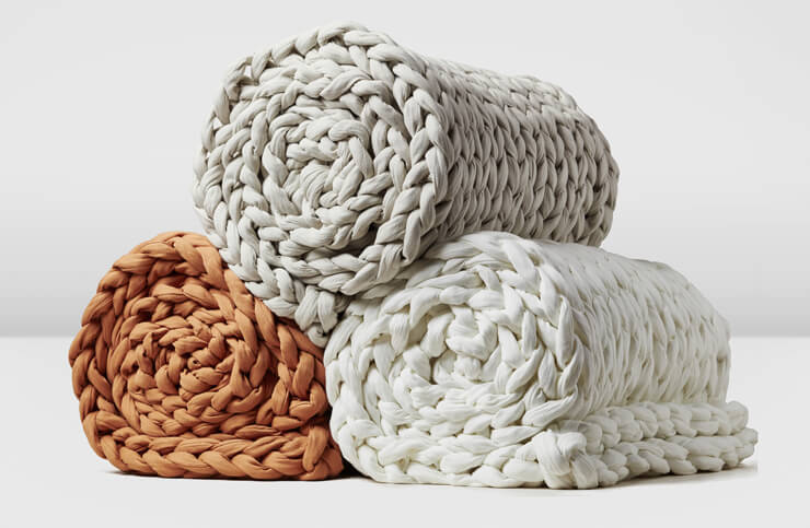 pile of woven weighted blankets