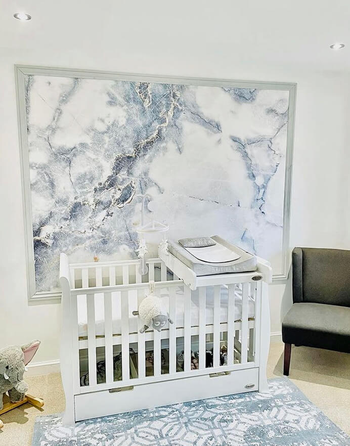 blue and white marble wallpaper in white nursery