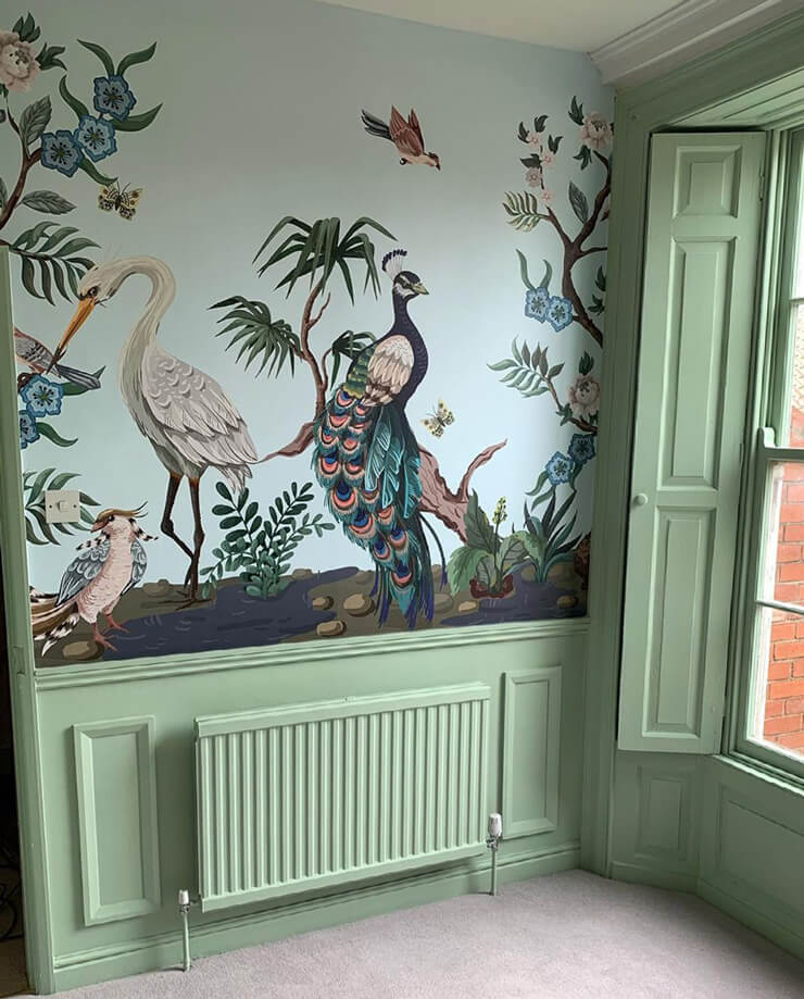chinoiserie style bird wallpaper in pea green vintage room