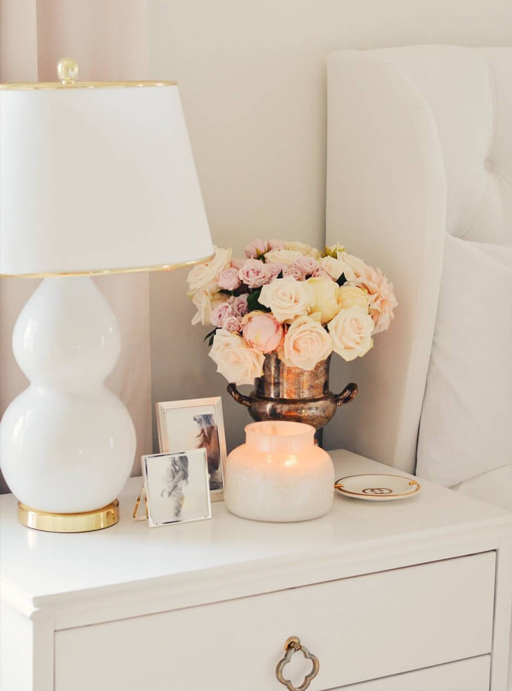 pink roses on bedstand