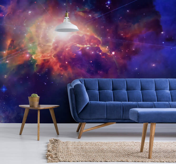 pink, purple and blue galaxy wallpaper in living room with blue couch wallpaper
