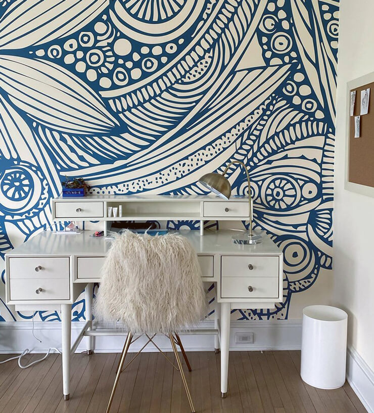 blue and white flower doodles wall mural in 70s style office