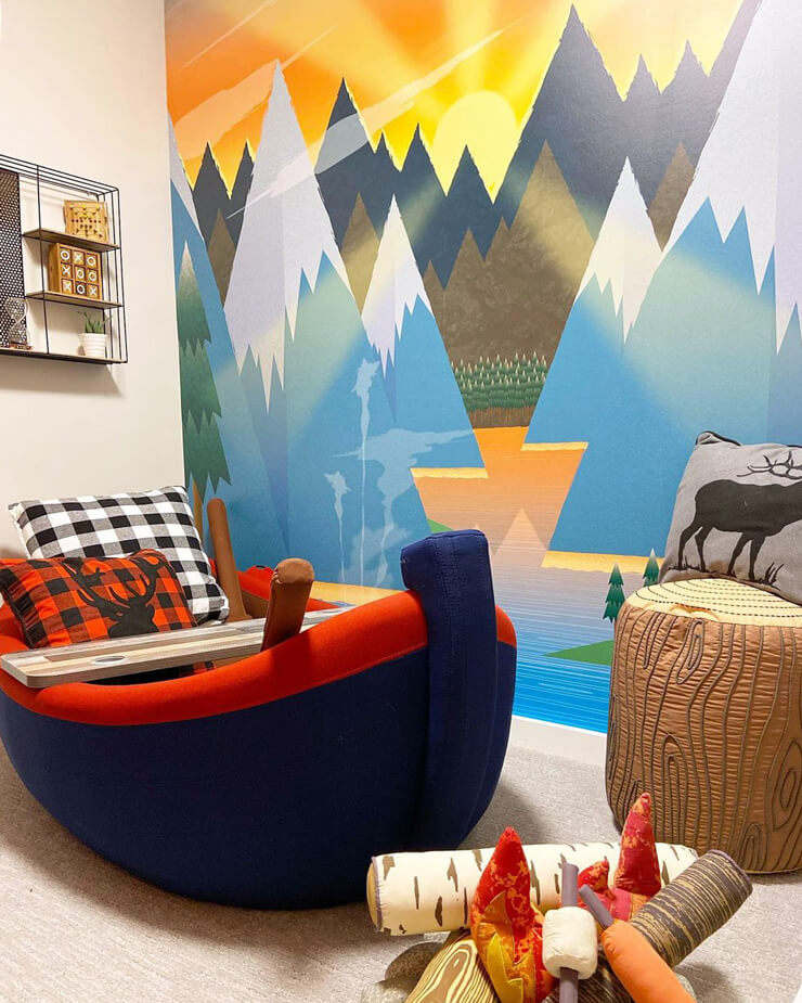 colorful abstract mountain wallpaper in camping styled kids room