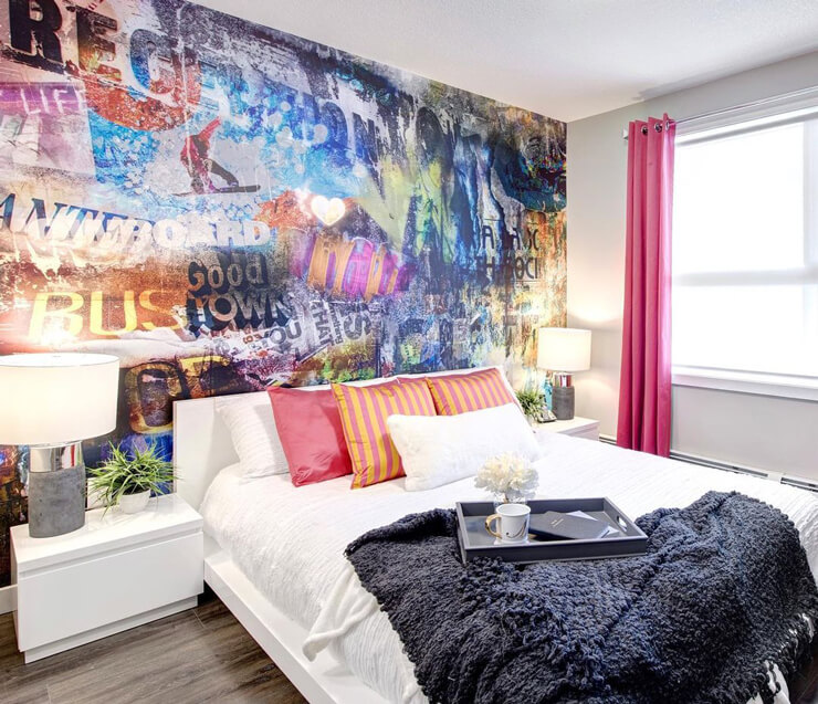 colourful graffiti wallpaper in luxurious designer bedroom